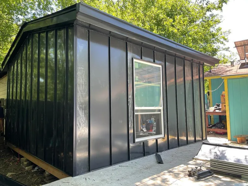 Black standing seam metal wall panels for Metal Roof Installation in Vicksburg