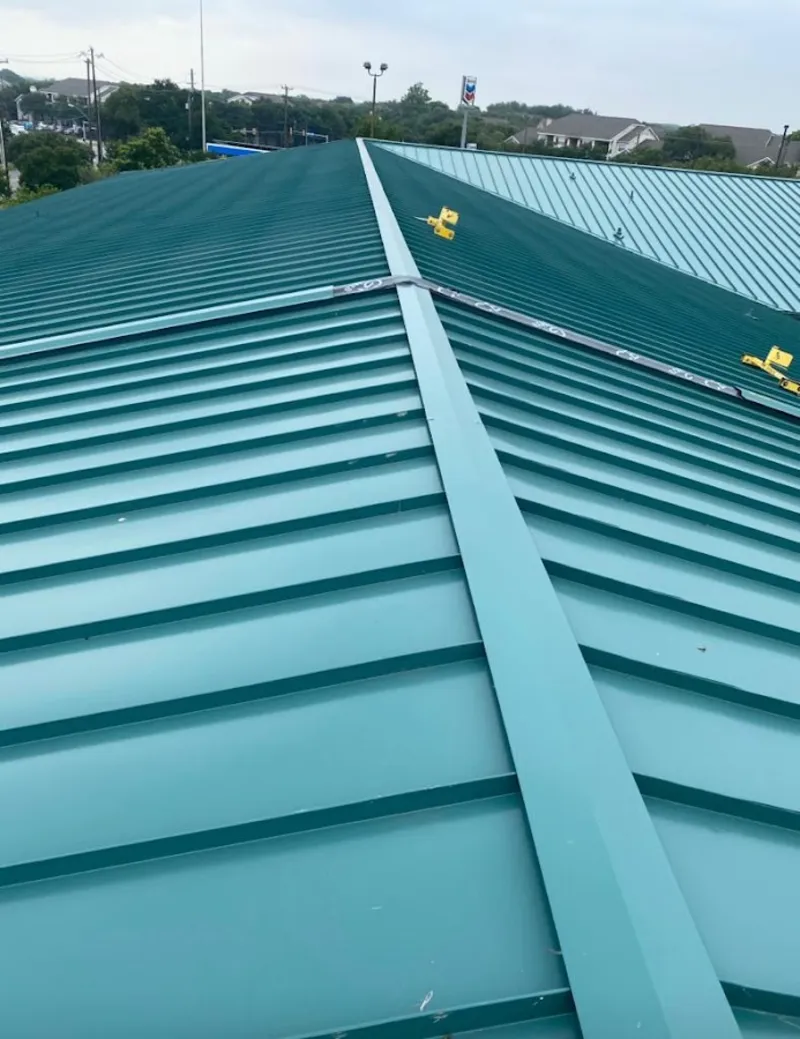 Green commercial metal roof ridge and valley for Metal Roof Repair in Vicksburg